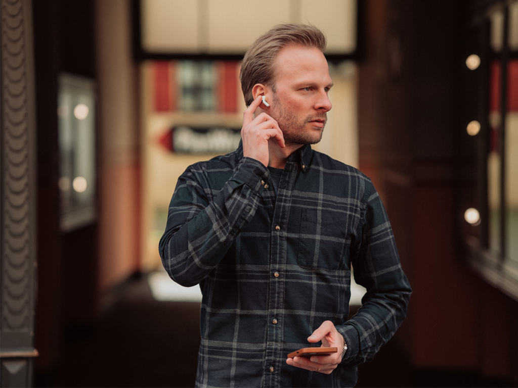 Man Taking A Call Using AirPods Pro (2nd Generation)