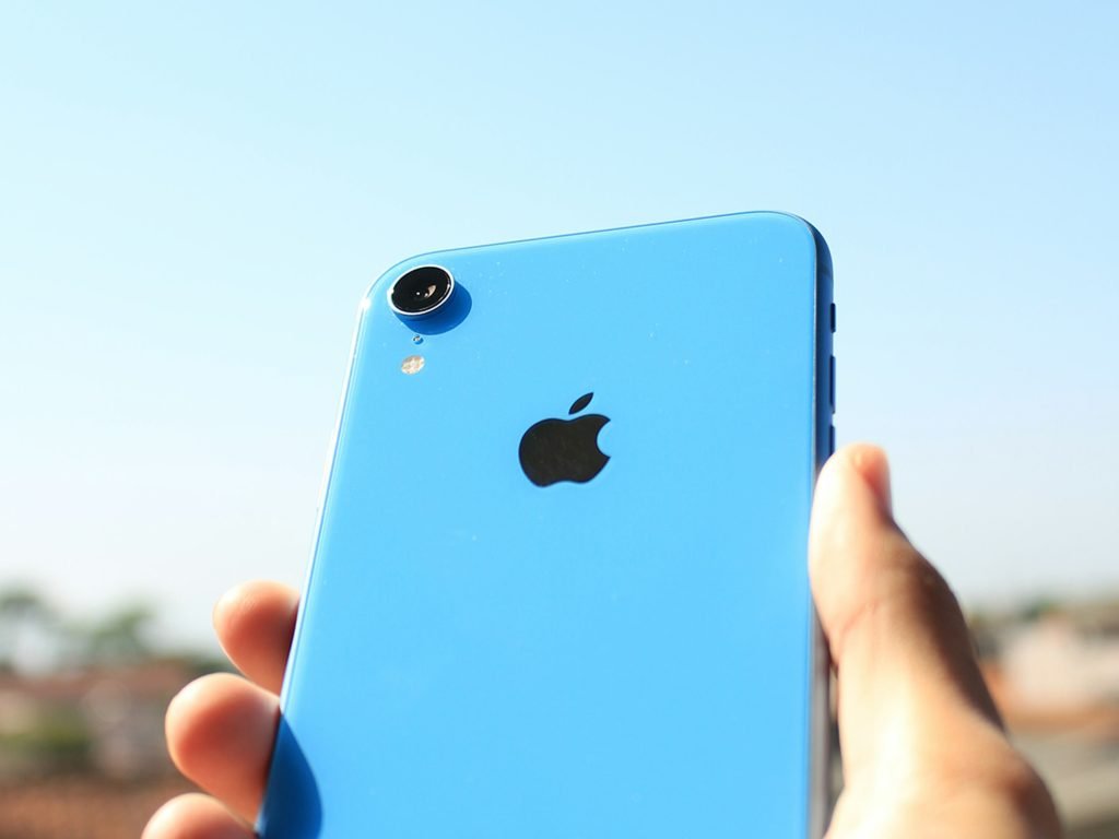 Blue iPhone XR outside in the sun